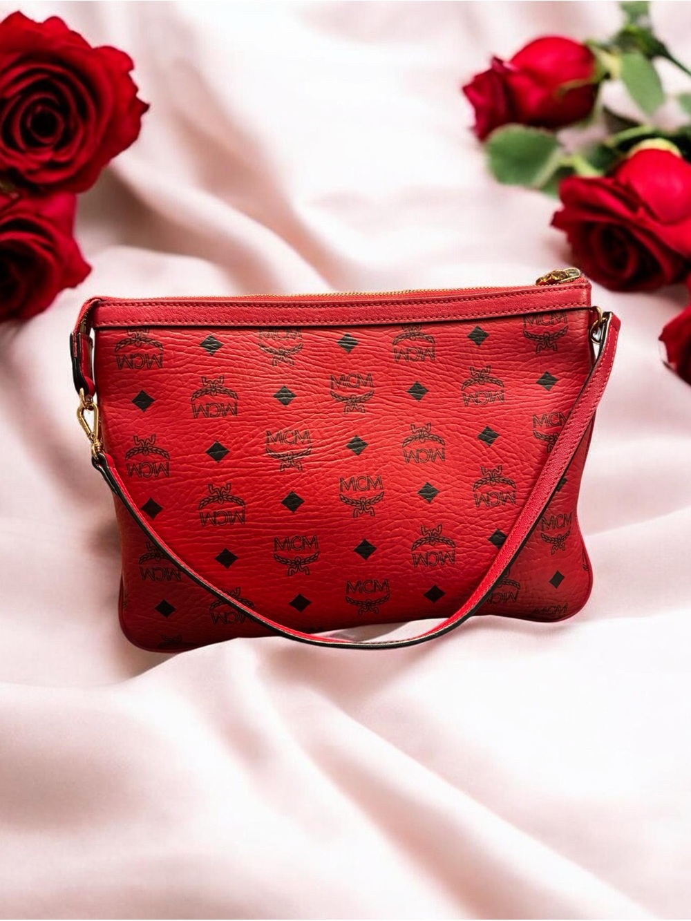 MCM Red Clutch with Black Accents, W is 11.5 and Hight is 8 inch.